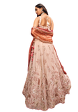 Lehenga rose poudré terracotta brodé mariage indien