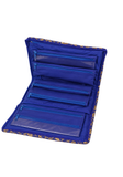 Intérieur de la pochette à bijoux avec six compartiments zippés