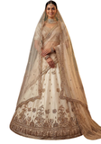Lehenga mariée ivoire Deepika avec double voile brodé et jupe en soie mixte