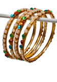 Bracelets Kavya multicolores & perles – lot de 4 bangles dorés décorés de pierres rouges, vertes et bleues et de perles ivoire.