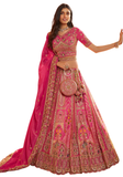 Lehenga de mariée Rani fuchsia et doré pour mariage indien