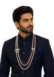 Mala Mayur bordeaux et ivoire porté avec sherwani bleu marine