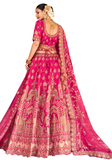 lehenga Haasini dos brodé avec pompons et détails dorés